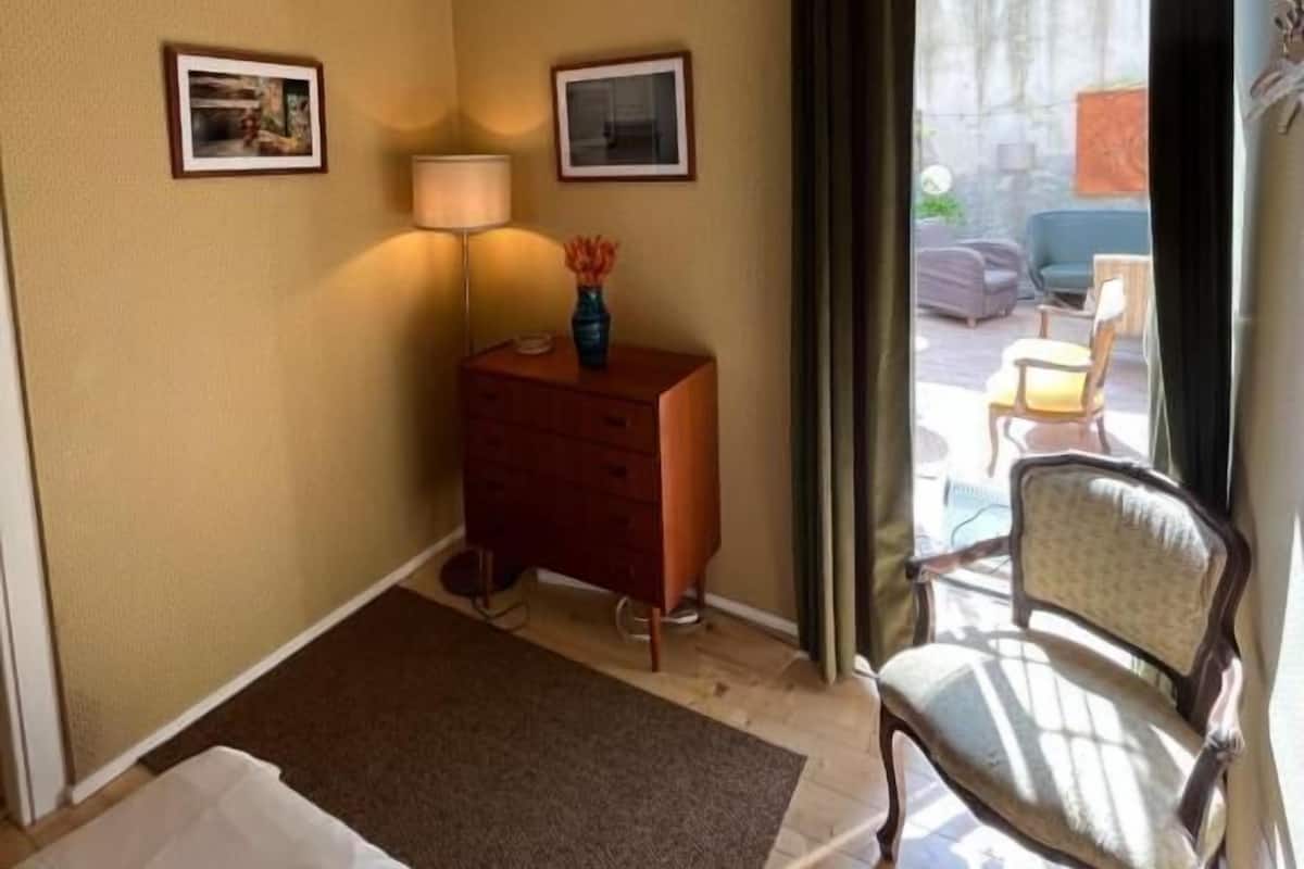 Deluxe Double Room, Patio, Garden View | Laptop workspace, soundproofing, iron/ironing board, free WiFi