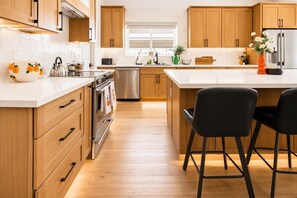Private kitchen - Hey Cutie - Remodeled Luxury Home · Pool + Hot Tub · Arcade Loft · Sleeps 14 (Mesa)