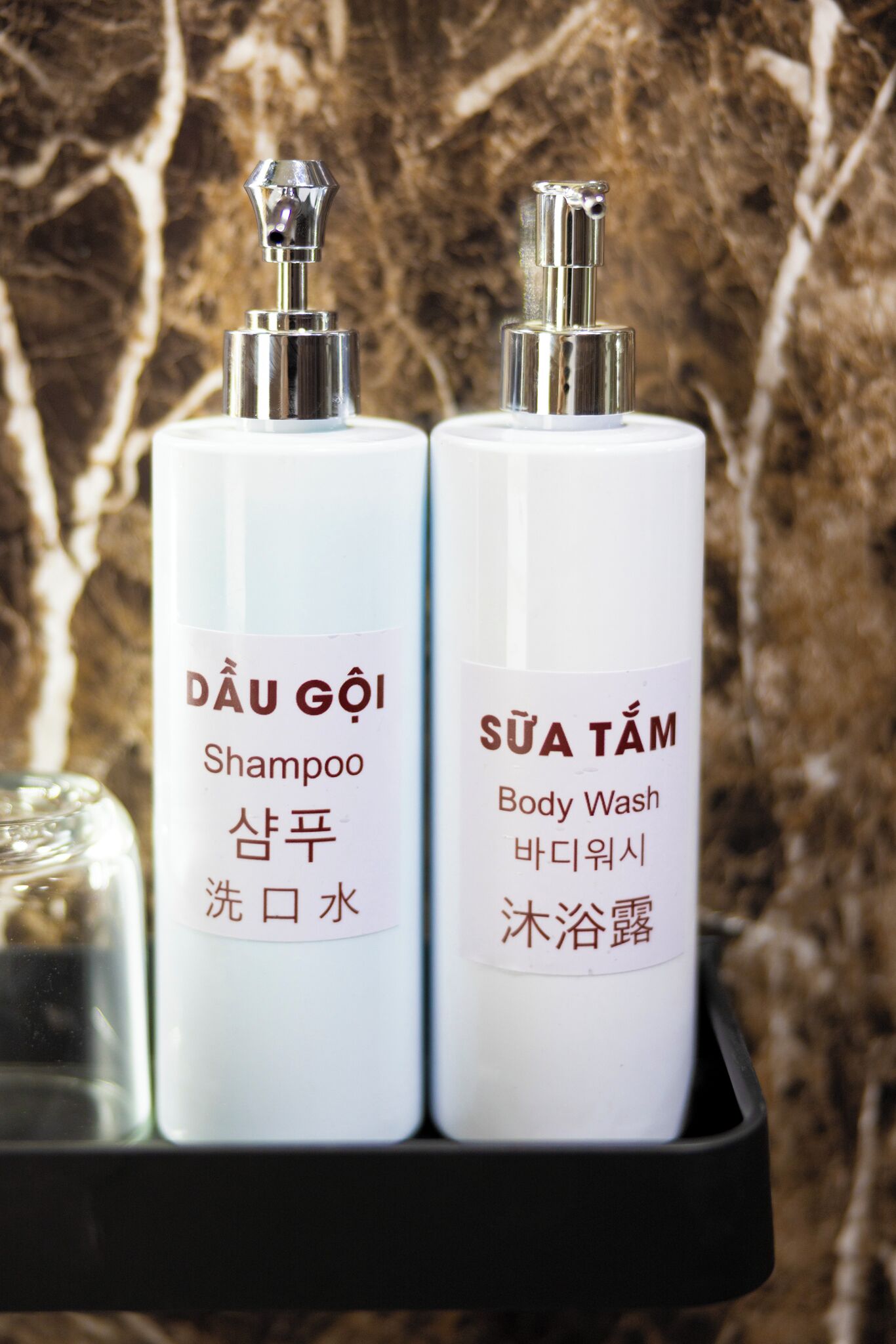 Deluxe Room, Balcony, Pool View | Bathroom amenities | Shower, hair dryer, slippers, towels