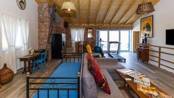Villa (Villa Panda with pool and sea view) | Living room | 32-inch flat-screen TV with satellite channels
