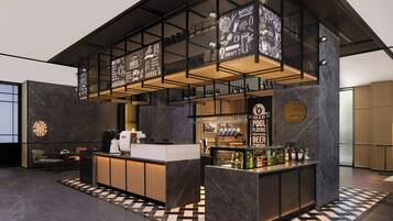 A modern bar area with a coffee station, a selection of bottles, and a sign indicating draft beer.