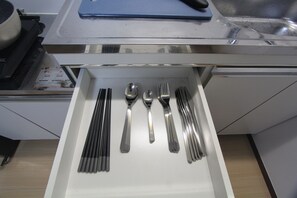 A drawer with utensils neatly arranged inside. - Great Location & Value! Cozy Shinjuku Stay - 5 min to Station & Kabukicho Tower4 (Kabuki Cho, Shinjuku Ku)