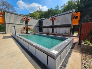 Outdoor pool, pool umbrellas, pool loungers