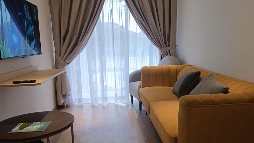 Deluxe Studio, Balcony, Garden View | Ruang tamu