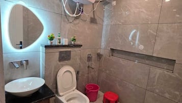 2Bhk Standard Apartment | Bathroom | Shower, towels, soap, shampoo