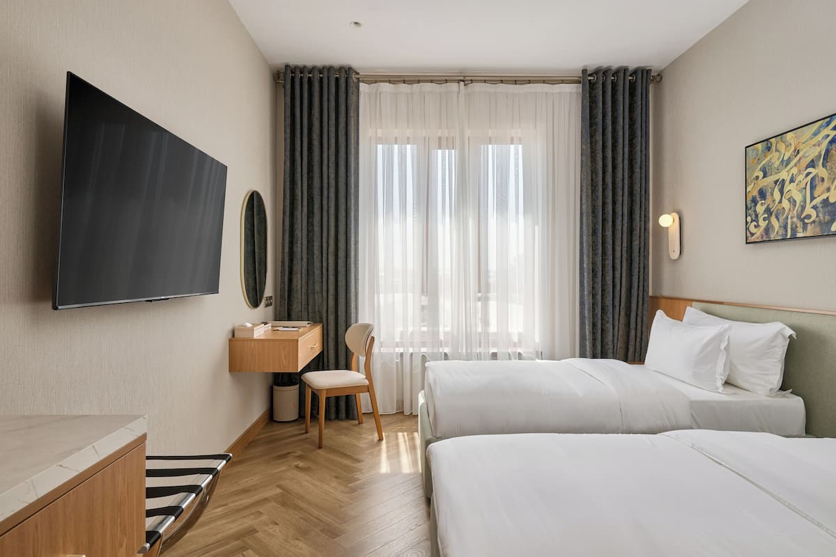Standard Twin Room | In-room safe, laptop workspace, blackout curtains, soundproofing