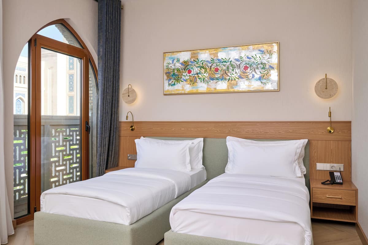 Deluxe Twin Room | In-room safe, laptop workspace, blackout curtains, soundproofing