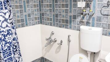 Shower, rainfall showerhead, slippers, towels