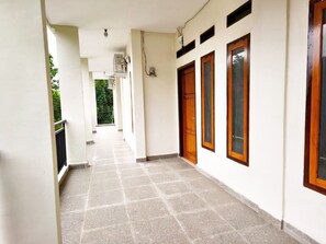 Apartament familiar, vistes al pati | Àrea exterior de l'allotjament