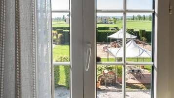 Deluxe Quadruple Room, Garden View | Interior