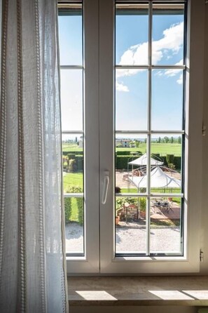 Deluxe Quadruple Room, Garden View | Interior - Agriturismo Torre Quadrana (Spello)