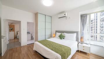 Departamento familiar, 2 habitaciones, aire acondicionado, vista a la ciudad | Cortinas blackout, insonorización y wifi gratis
