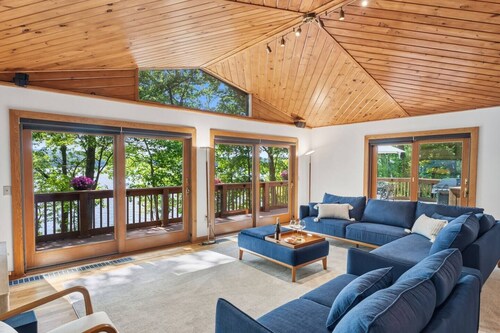 Lakefront Seneca Lake retreat with a private beach, dock, hot tub, and game room. Minutes from wineries and Watkins Glen. Pet friendly.