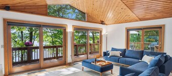Lakefront Seneca Lake retreat with a private beach, dock, hot tub, and game room. Minutes from wineries and Watkins Glen. Pet friendly.