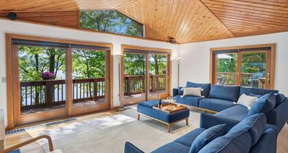 Lakefront Seneca Lake retreat with a private beach, dock, hot tub, and game room. Minutes from wineries and Watkins Glen. Pet friendly.