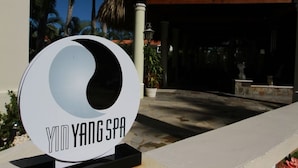 A sign for Yin Yang Spa with a circular design. - All inclusive paid at the resort  (Puerto Plata)