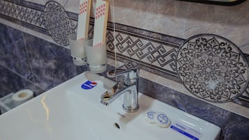Deluxe Double or Twin Room | Bathroom | Shower, hair dryer, slippers, towels