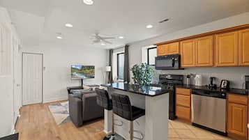 Apartment, 2 Bedrooms | Private kitchen | Coffee/tea maker, dining table