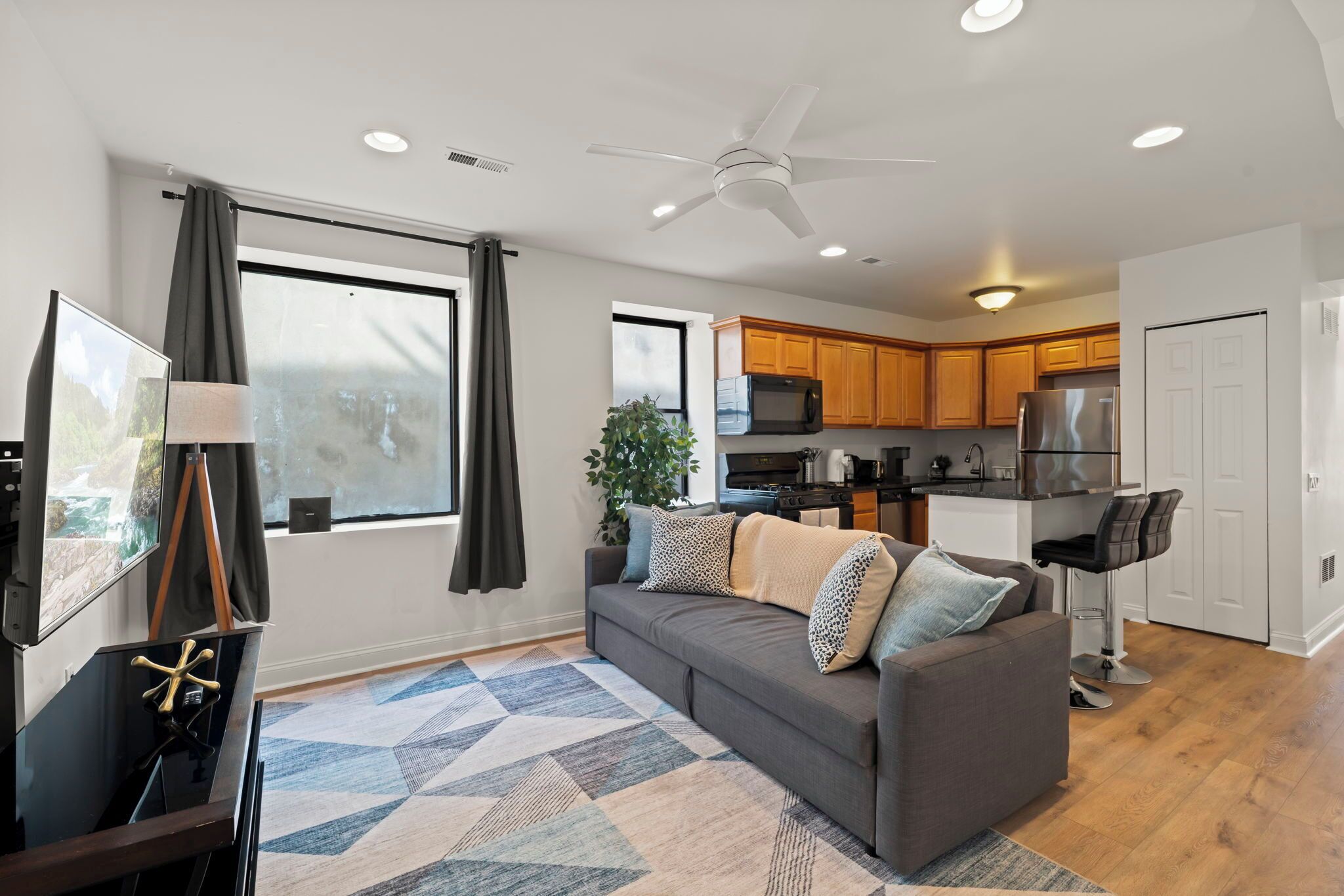 Apartment, 2 Bedrooms | Living area | 55-inch Smart TV with digital channels, streaming services