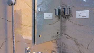 Shower, free toiletries, towels, soap