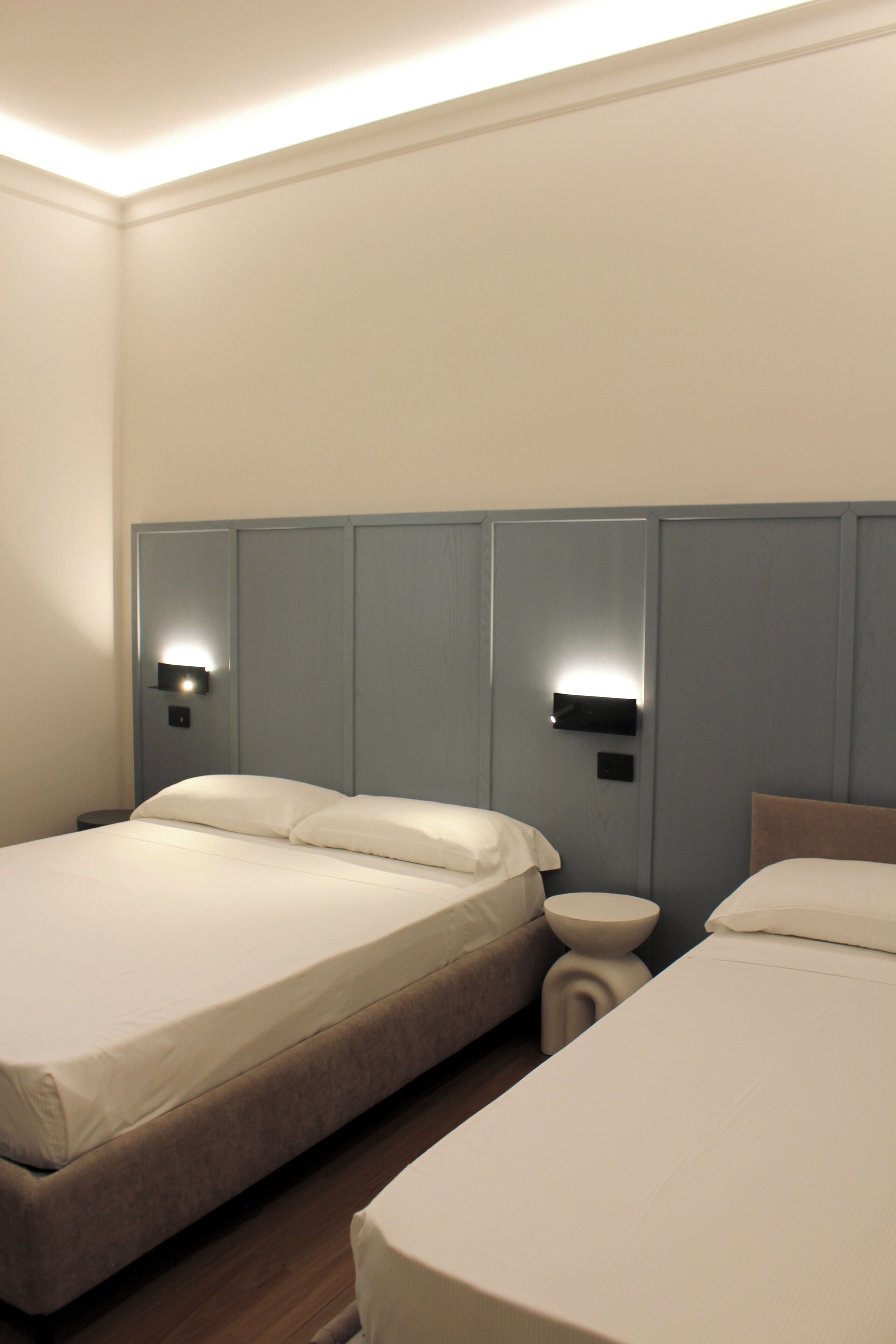 Deluxe Triple Room | In-room safe, desk, laptop workspace, blackout drapes