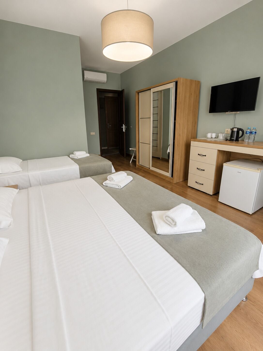 Triple Room, Balcony, Sea View | In-room safe, travel crib, free WiFi, bed sheets
