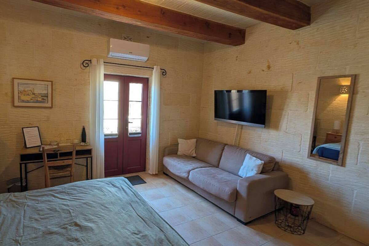 Chambre Double Classique, balcon | Coin séjour