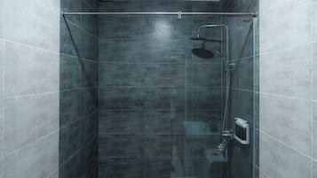 Shower, hair dryer, slippers, towels