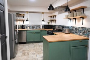 Fridge, microwave, dishwasher, coffee/tea maker