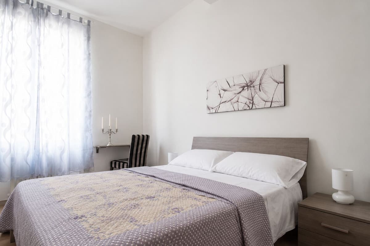 Departamento familiar, vista a la ciudad | Wifi gratis, muebles diferentes y ropa de cama 