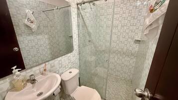 Shower, towels, soap, toilet paper