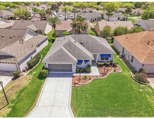 3-bedroom house in peaceful Village of Winifred of the villages with golf cart.