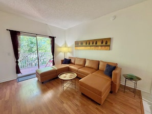 Living area - Peaceful Beachwalk Escape! Updated 3rd-Floor Condo w/ Lanai, Pool & Hot Tub (Fort Myers)