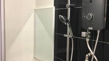 Shower, free toiletries, towels, soap