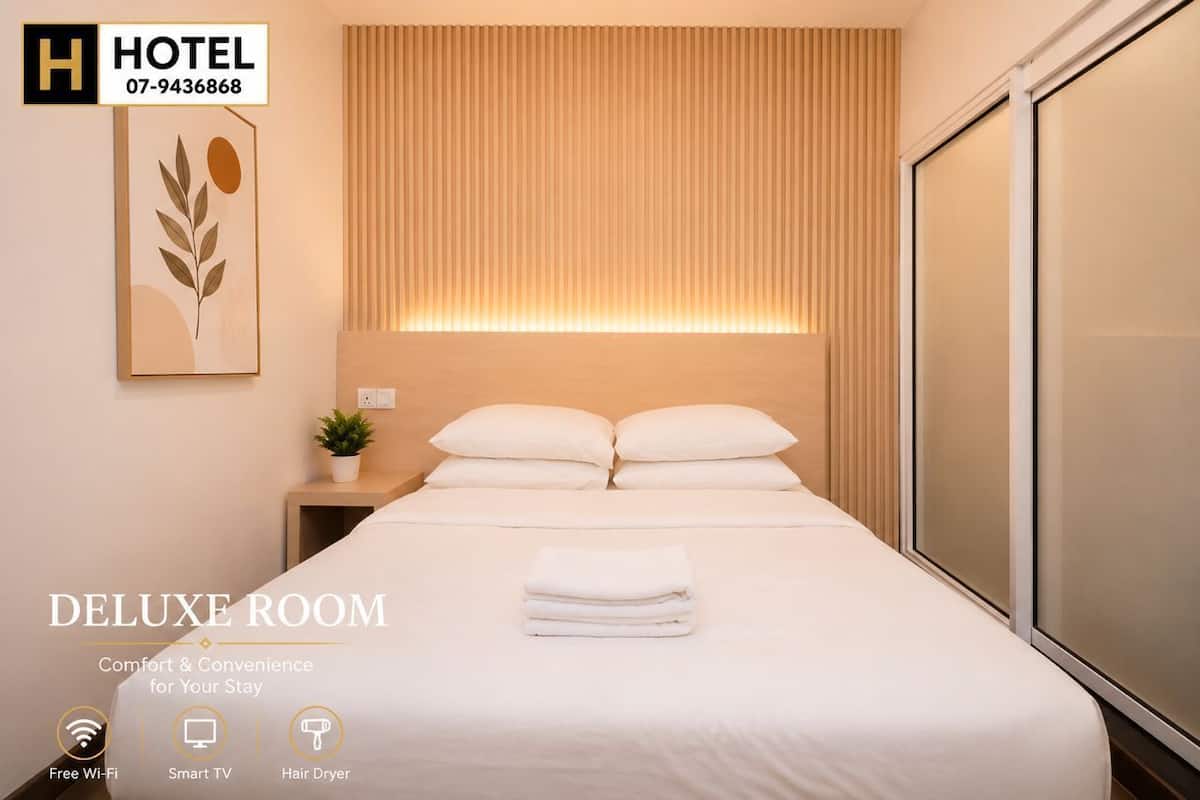 Deluxe Room | Iron/ironing board, free WiFi, bed sheets