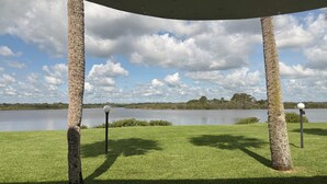 A gazebo with a view of a lake and trees in the background. - Waterfront Flagler Beach Retreat I 2 King Beds I 2 Full Baths I Kayaks (Flagler Beach)