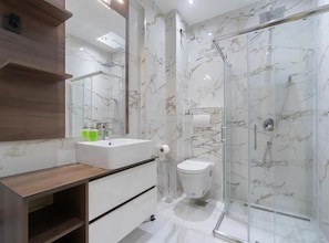 A modern bathroom with a marble shower, a wooden vanity, and a large mirror. - One Bedroom Suite with Sea View and Balcony (305) (Dobra voda)