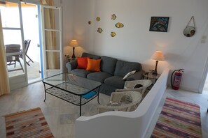 Villa, 3 Bedrooms, Smoking, Balcony | Living room | Books - Charming Naxos Villa, Ocean Views, Modern Comfort, Tranquil Escape (Naxos)