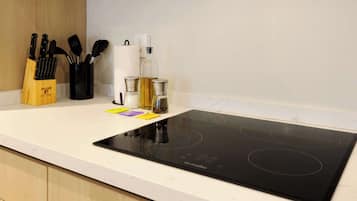 Fridge, microwave, stovetop, coffee/tea maker