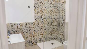 Deluxe Double Room, Private Bathroom | Bathroom | Shower, hair dryer, towels, soap