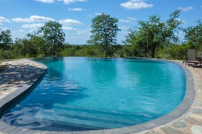 Safari house in Kruger National Park with private waterhole