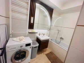 Hair dryer, towels, soap, toilet paper - Modern Apartment in Herastrau Bucharest Premium Stay and Comfort (București)