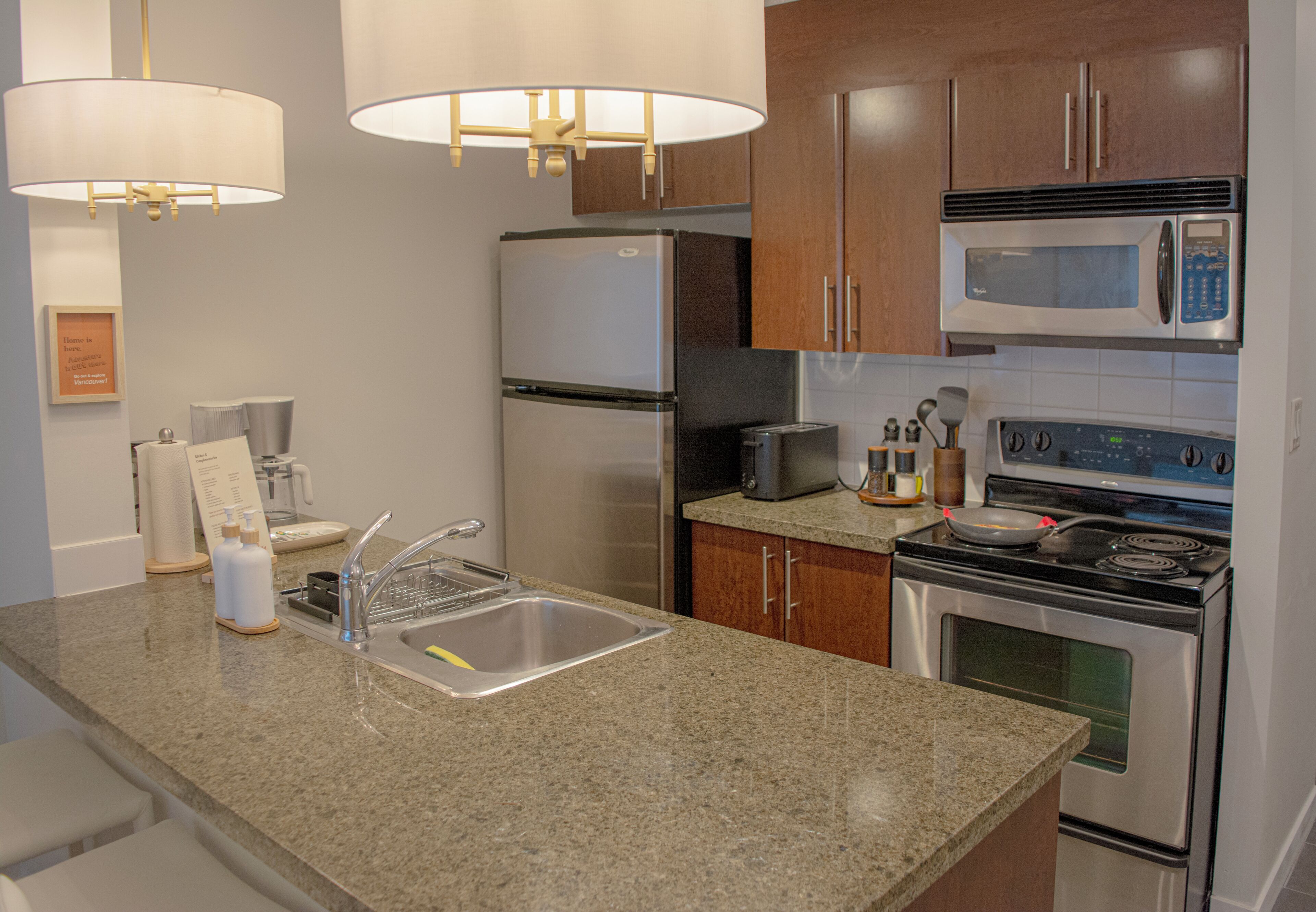 Coffee/tea maker, fridge, microwave, oven