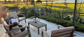 A restorative stay where the mighty Waikato awa meets the Tasman Sea