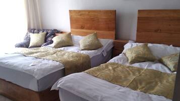 Quarto casal ou duplo família | Edredons de pluma, Wi-Fi de cortesia, roupa de cama