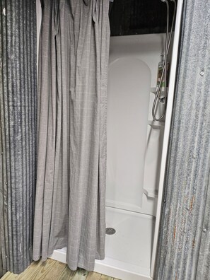 Shower, hair dryer, towels, soap - Lovely 2-bedroom recreational vehicle with full bath and AC in Sergeant Bluff. (Sergeant Bluff)