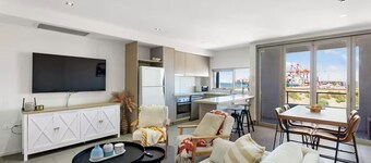 Stylish Coastal Penthouse with Port Views