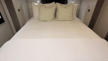 1 dormitorio, cuna de viaje, wifi gratis y ropa de cama