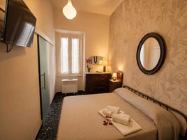 Premium bedding, down duvets, memory-foam beds, minibar