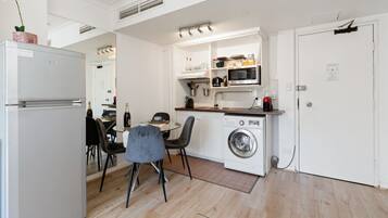Fridge, microwave, stovetop, coffee/tea maker